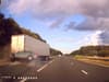 Speeding driver smashes into the back of a lorry before flipping over multiple times in dramatic footage